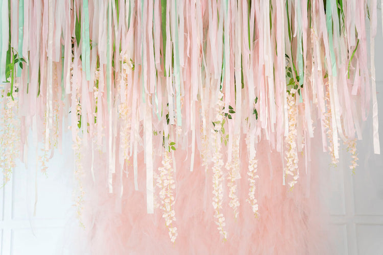 Pink and green floral fringe backdrop garland by Oh My Darling Party Co