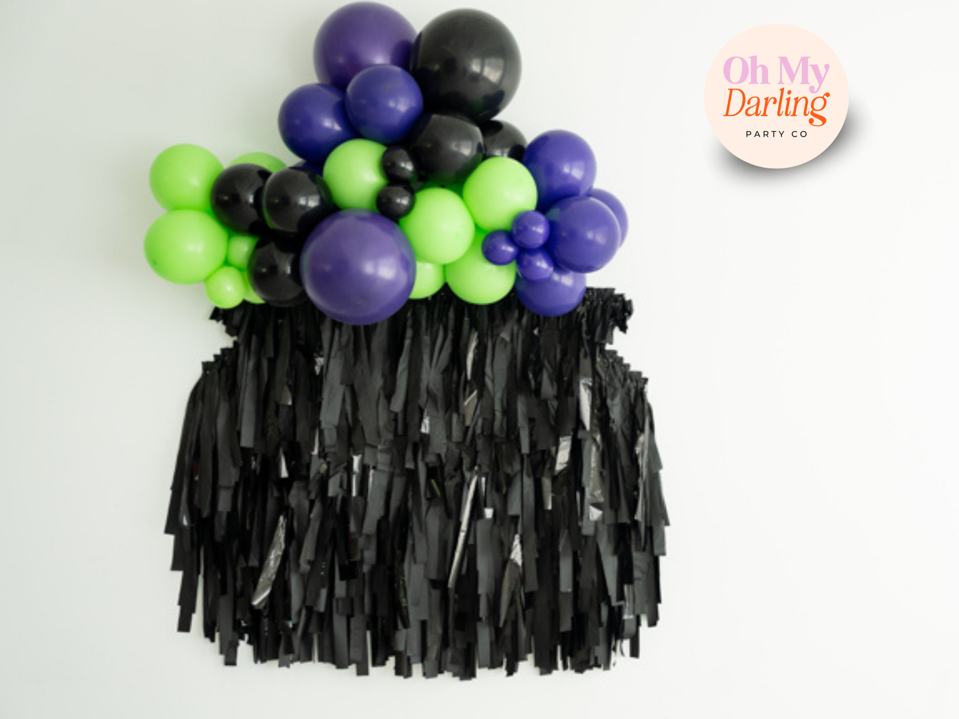 Cauldron Shape Backdrop - Etsy 1 fringe garland hanging against a white wall with balloons. Fringe decor perfect for corporate events or parties.