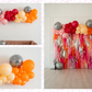 Let's Disco Balloon Kit fringe garland hanging against a white wall with balloons. Fringe decor perfect for corporate events or parties.