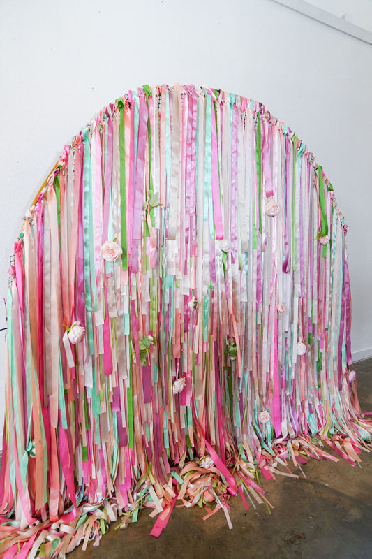 Petals and Prosecco Semi Circle Fringe Backdrop