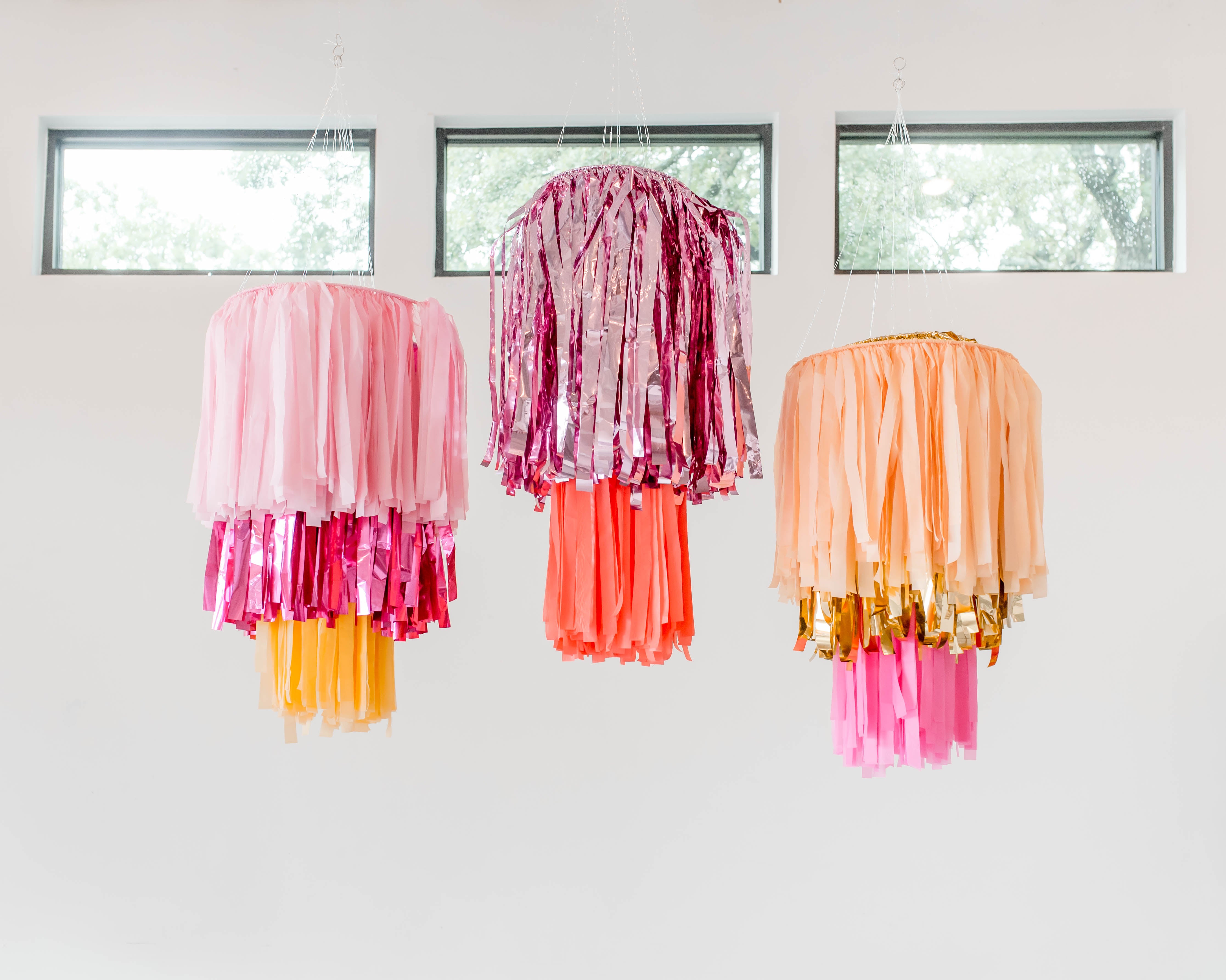 Handmade tiered aerial ring chandelier as a statement wedding decor piece