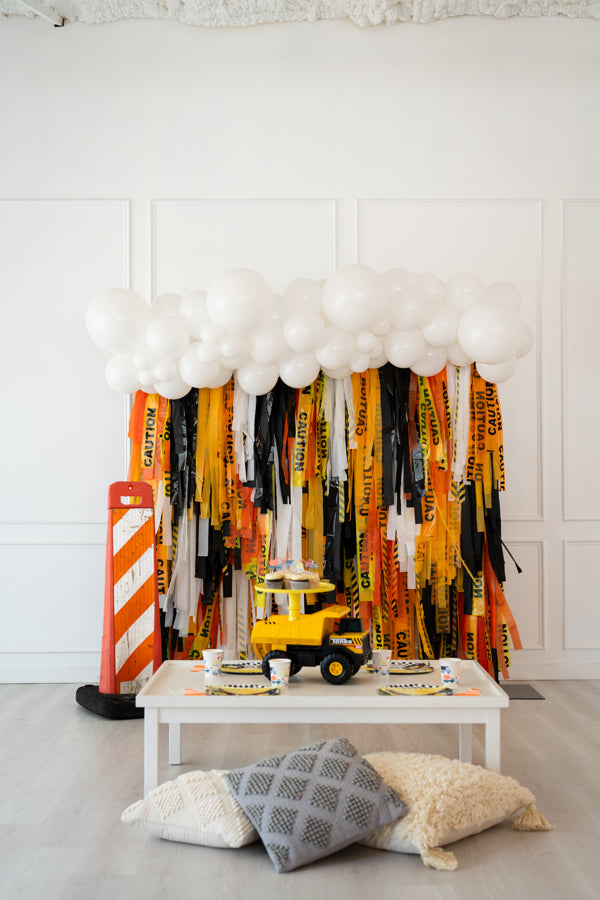 Construction-Caution Fringe Backdrop exclusive at Oh My Darling Party