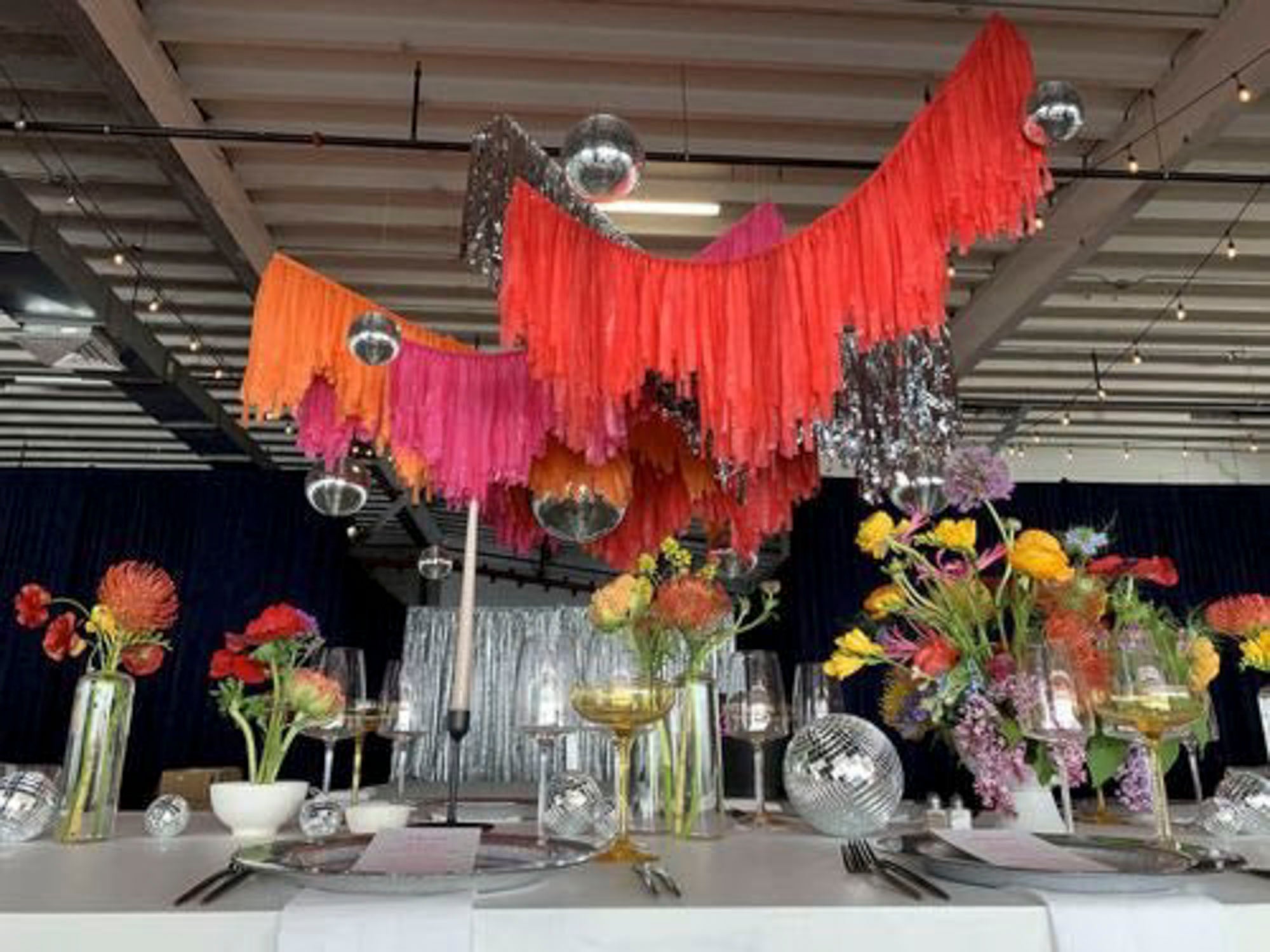Hanging fringe aerial party installation by Oh My Darling Party Co
