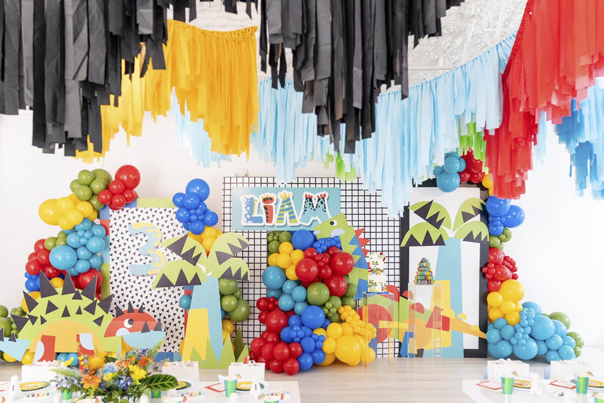 Primary color boy's aerial fringe party installation by Oh My Darling Party Co